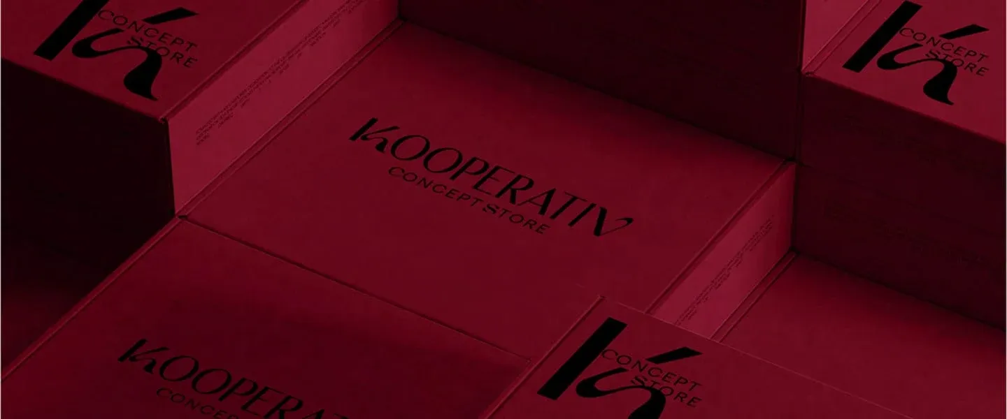 Burgundy KOOPERATIV Concept Store boxes in the gift certificate block